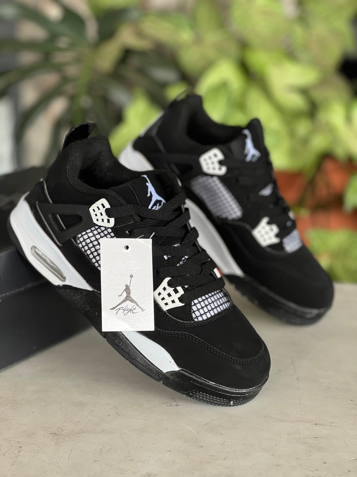 Air Jordan 4 Sneakers - Black/White