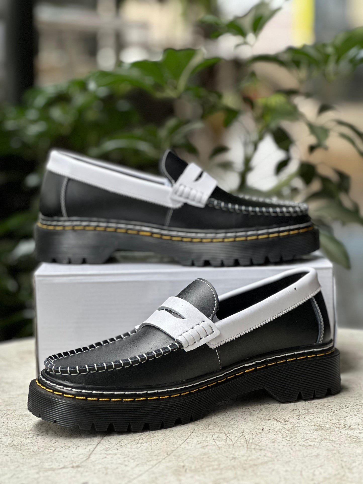 Black & White Clarks Penny Loafers