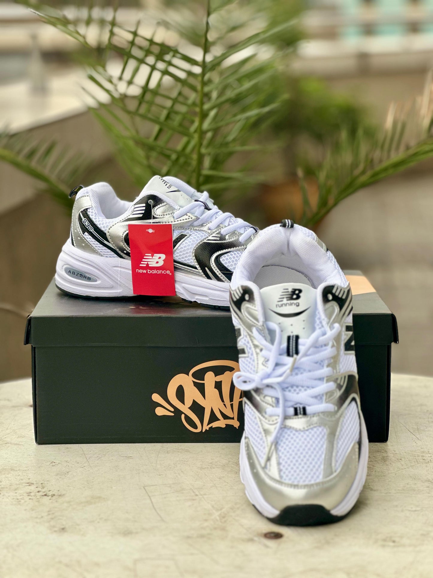 New Balance  “Silver & Black” Running Sneaker